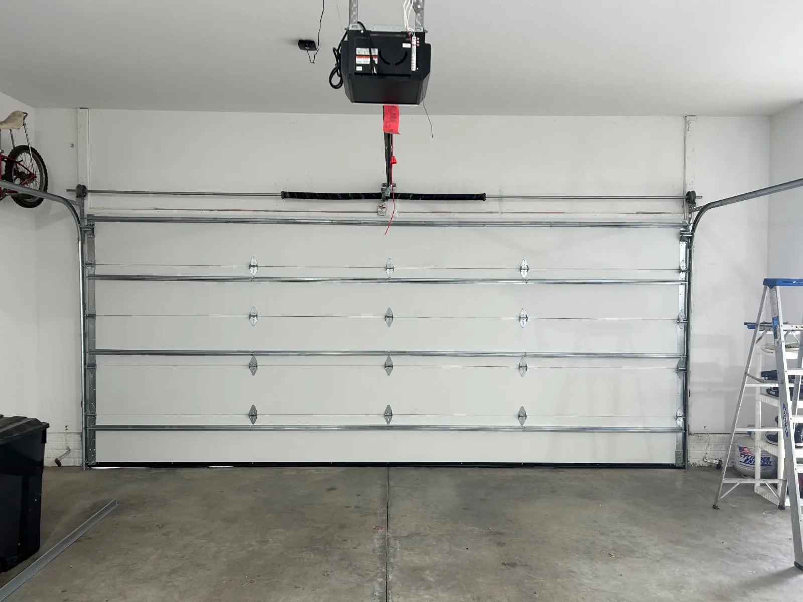 Double garage door installation interior view