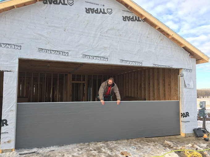 Shawn on the job — garage door installation in Sioux City